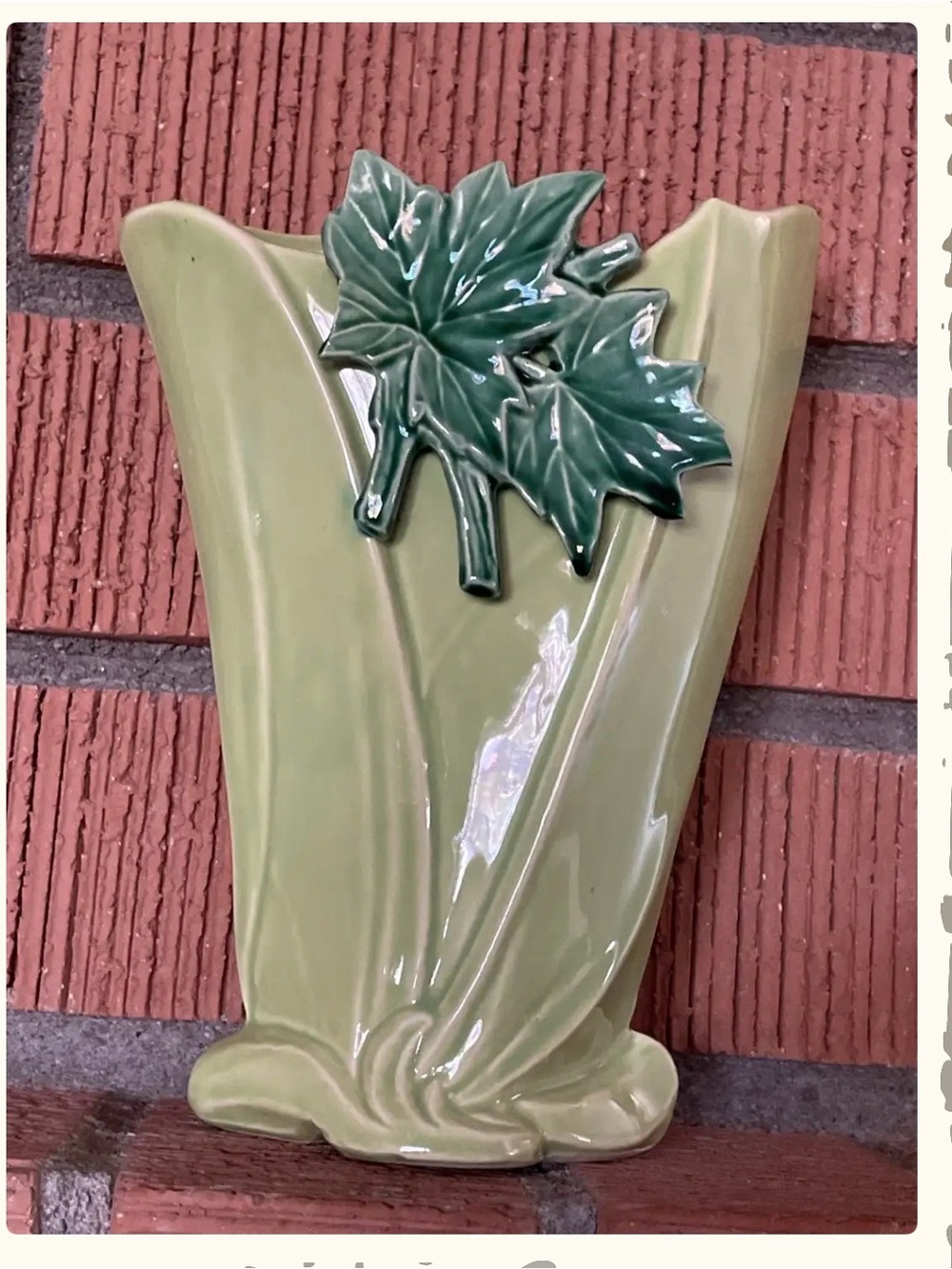 Light Green Ceramic Wall Pocket Vase with Dark Green Leaf Accent